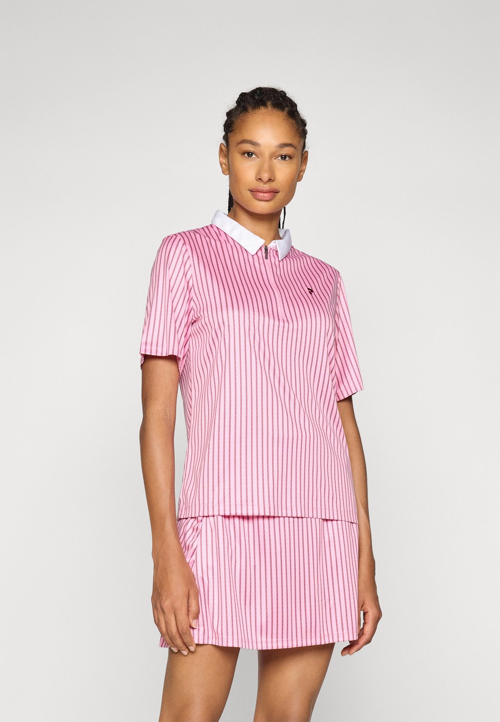 

Рубашка поло GRAPHIC ZIP Peak Performance, розовый