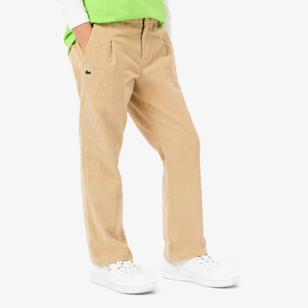 Детские вельветовые брюки бежевые от Lacoste — фото 3