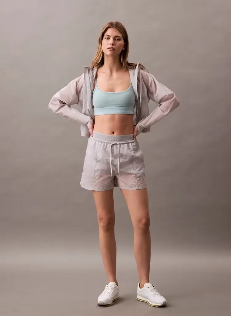 Бюстгальтер спортивный с регулируемыми бретелями Calvin Klein, эфирный — фото 4