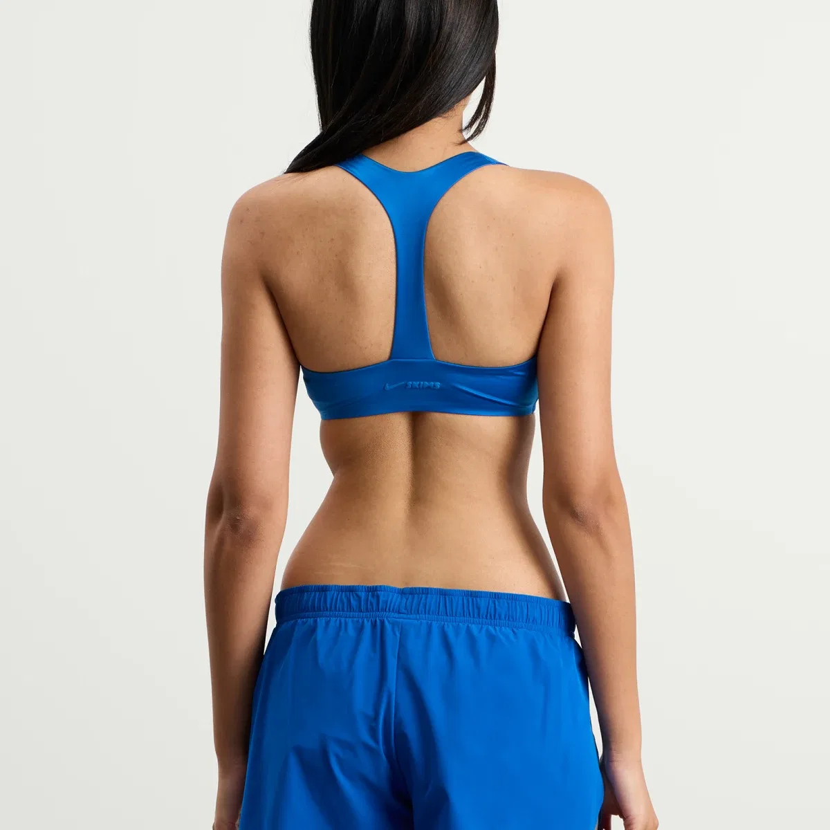 Спортивный бюстгальтер с глубоким вырезом Nike, Cobalt — фото 3