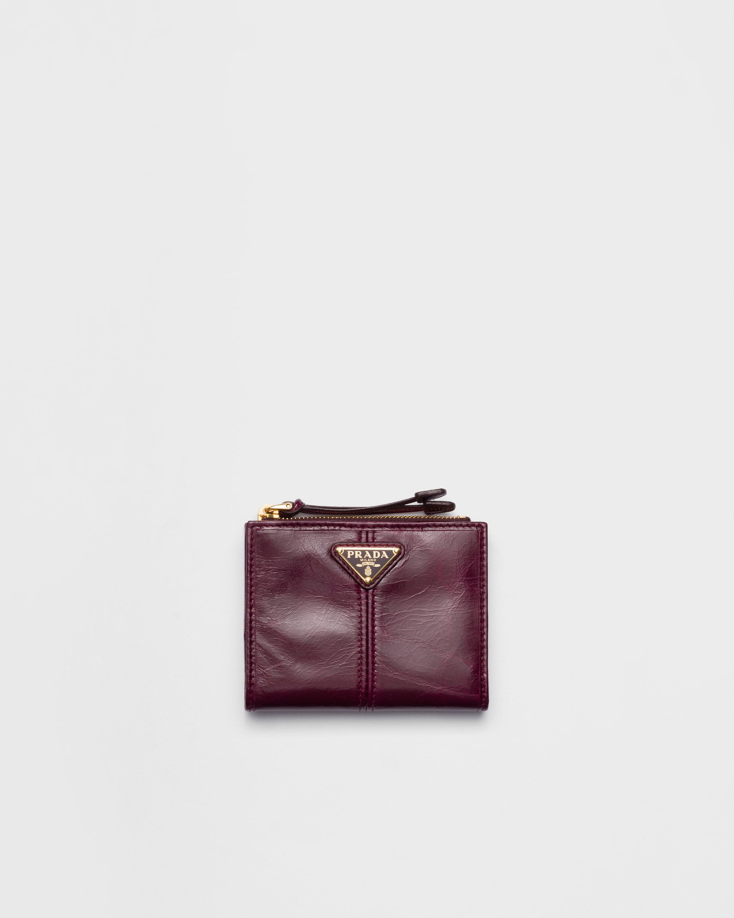 

Маленький кожаный кошелек Prada, бордовый