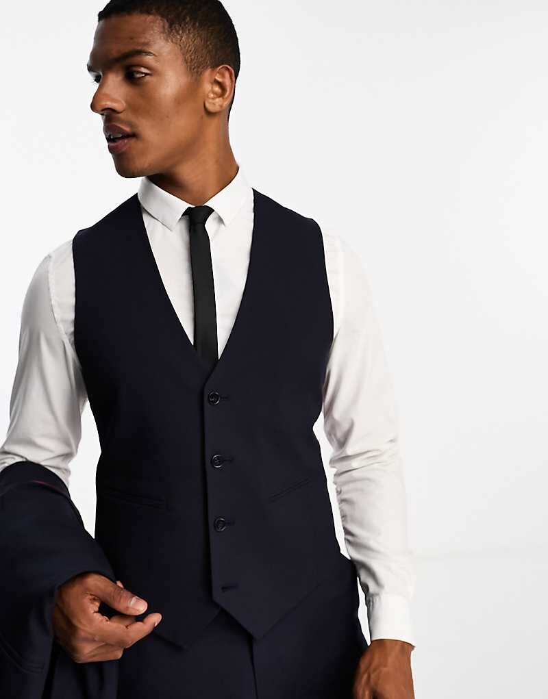 

Темно-синий тонкий костюмный жилет ASOS DESIGN