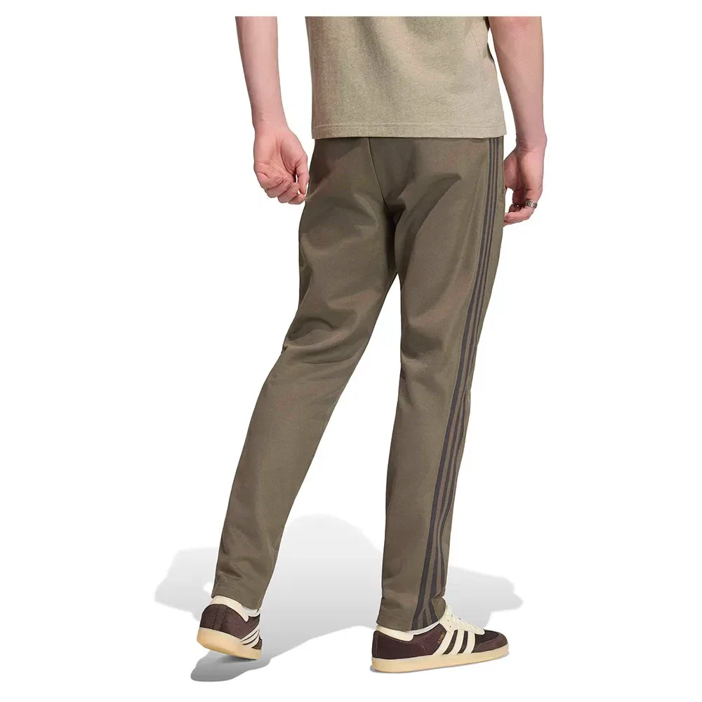 Мужские спортивные брюки с зауженным кроем Adidas Originals SST Track, Green — фото 2