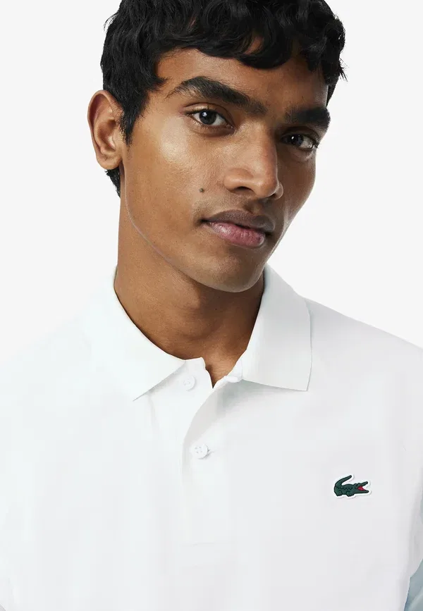 Поло Lacoste, однотонное, белый — фото 4