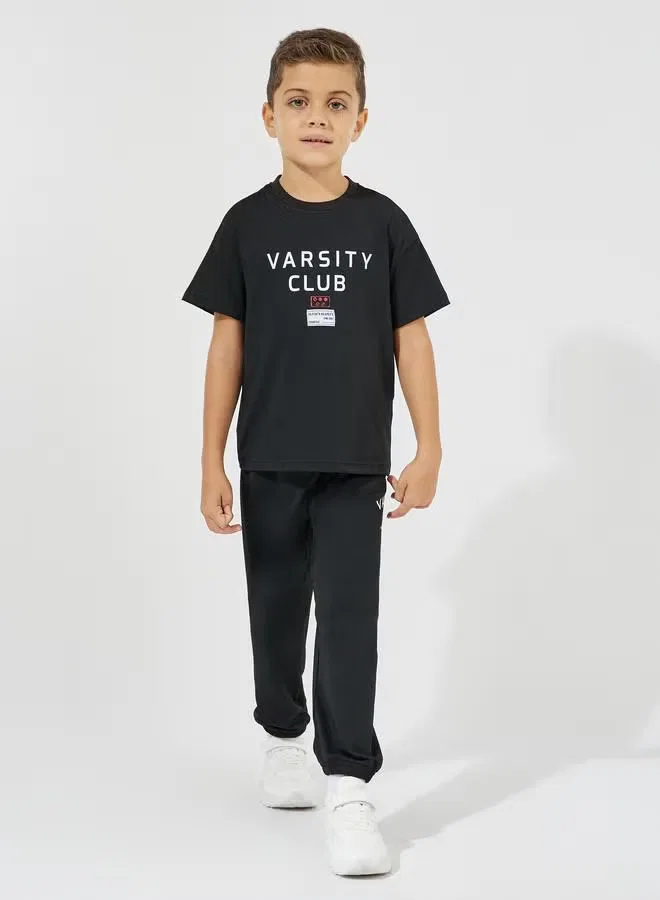 Комплект футболка оверсайз с принтом и джоггеры Varsity print Styli, черный — фото 2