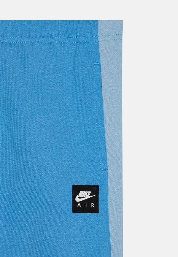 Брюки хлопковые Club unisex Nike Sportswear university blue, psychic blue, white, белый/синий — фото 3