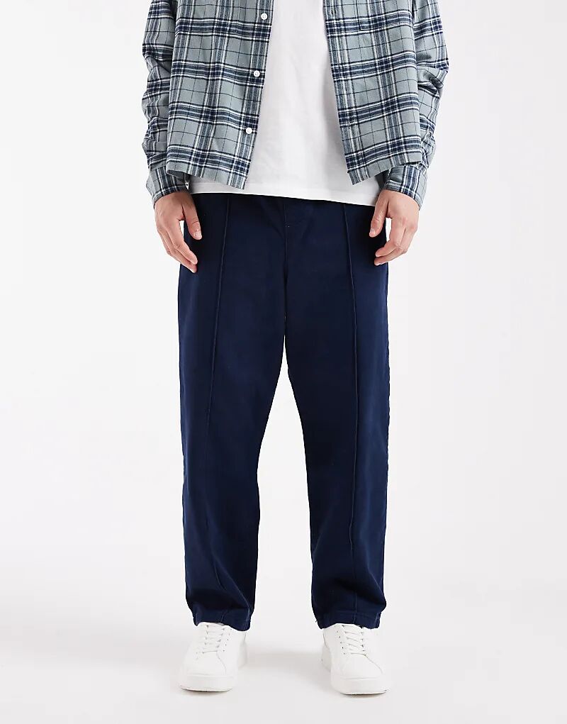 

Зауженные брюки ASOS DESIGN темно-синего цвета с защипами