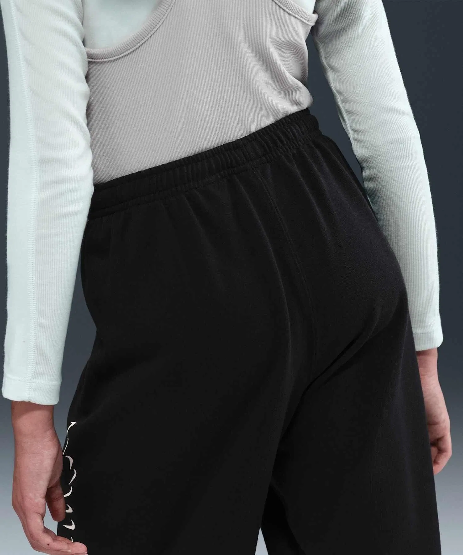 Детские флисовые брюки Nike Sportswear Dri-FIT для девочек, HV0736-010, черные. — фото 3