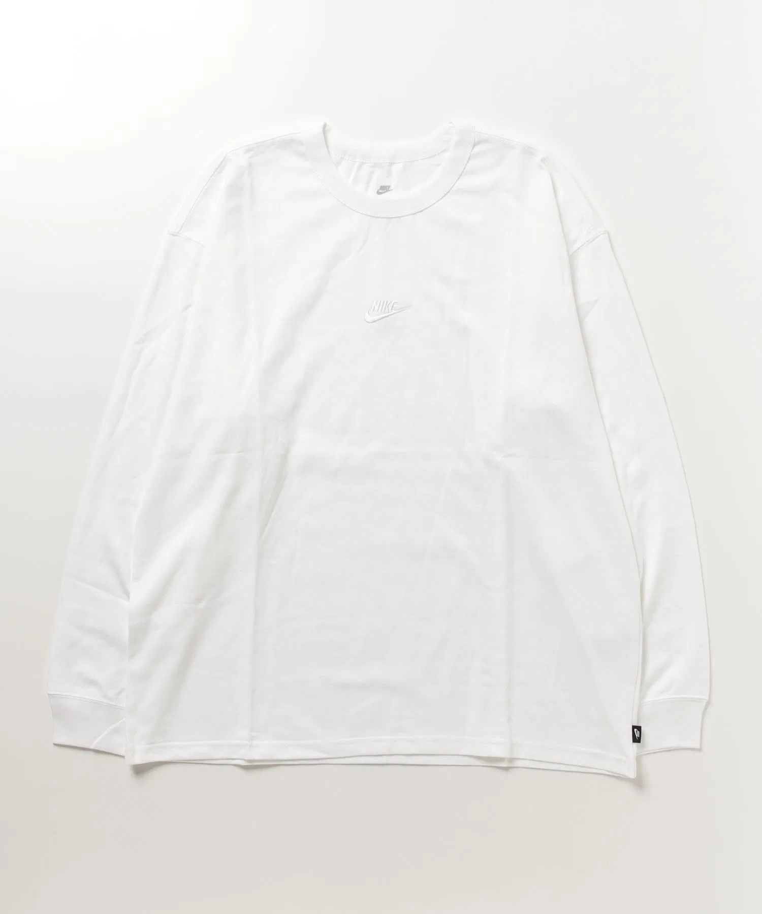 Мужская футболка Nike PRM ESS LS с длинным рукавом белого цвета