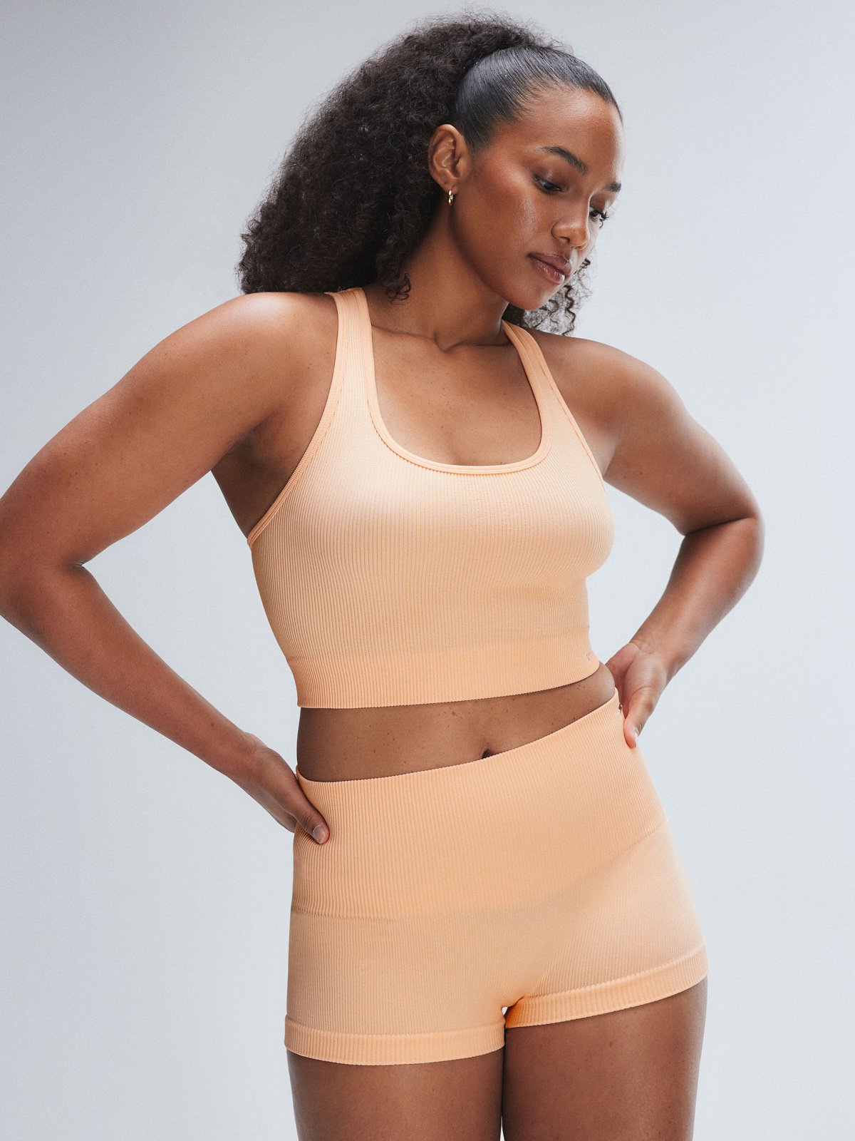 

Спортивный топ Savage X Fenty Seamless Sport Racerback Tank, цвет Pink Orange