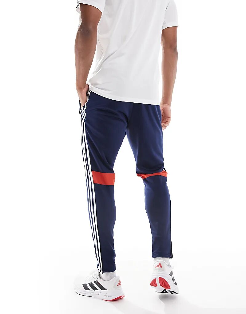 Зимние тренировочные брюки adidas Football Tiro 25 Essentials в цвете Team Navy Blue 2 / Red / White Adidas Performance — фото 2