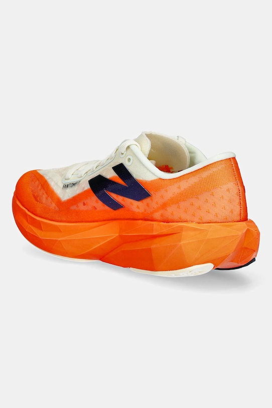 Беговые кроссовки FuelCell Rebel v2 New Balance, оранжевый — фото 3