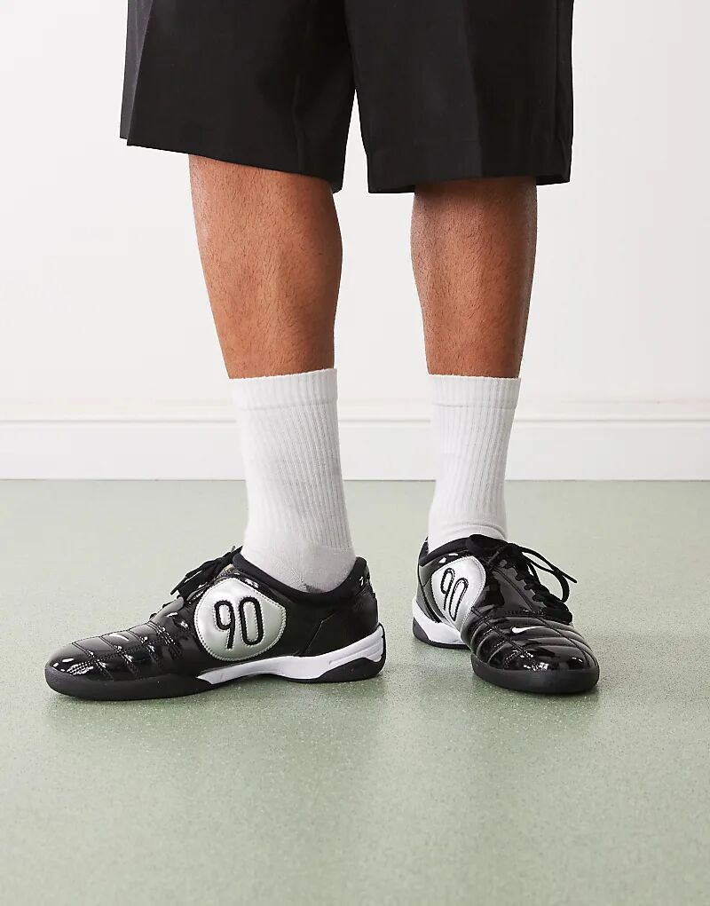 

Кроссовки унисекс Nike T90 черного цвета