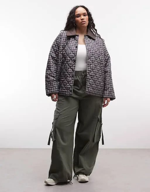 

Коричневая стеганая куртка в клетку Noisy May Curve