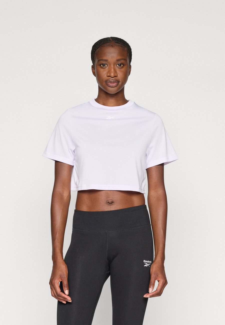 

Футболка Reebok MICHAELA CORE CROP TOP, Digital Gleam/Lilac