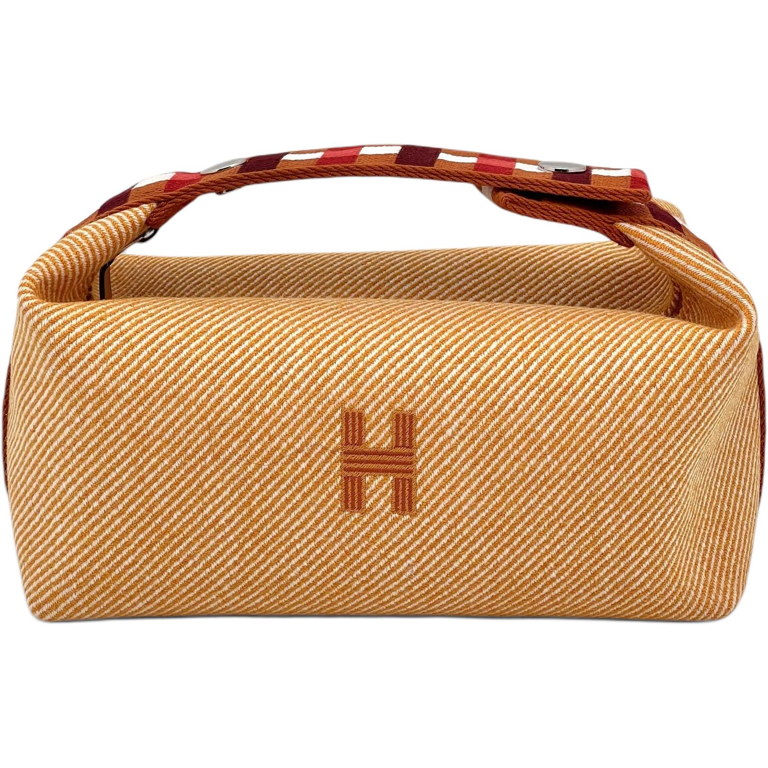 

HERMES Большая унисекс косметичка из холста оранжевого цвета, Orange