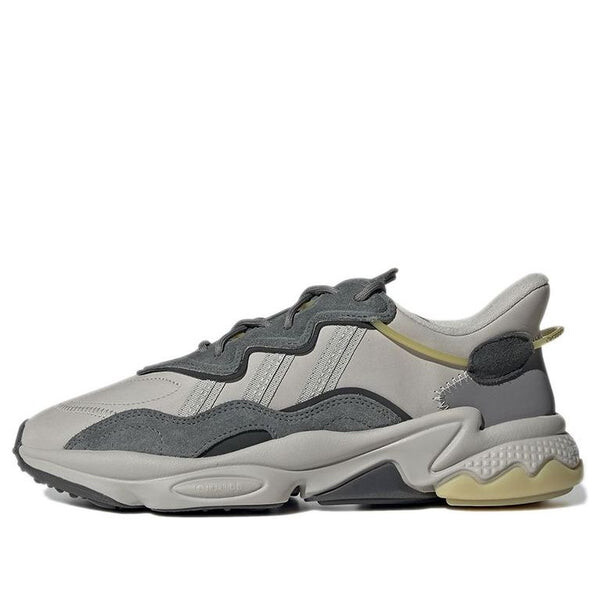 

Кроссовки оригиналы ozweego Adidas, серый