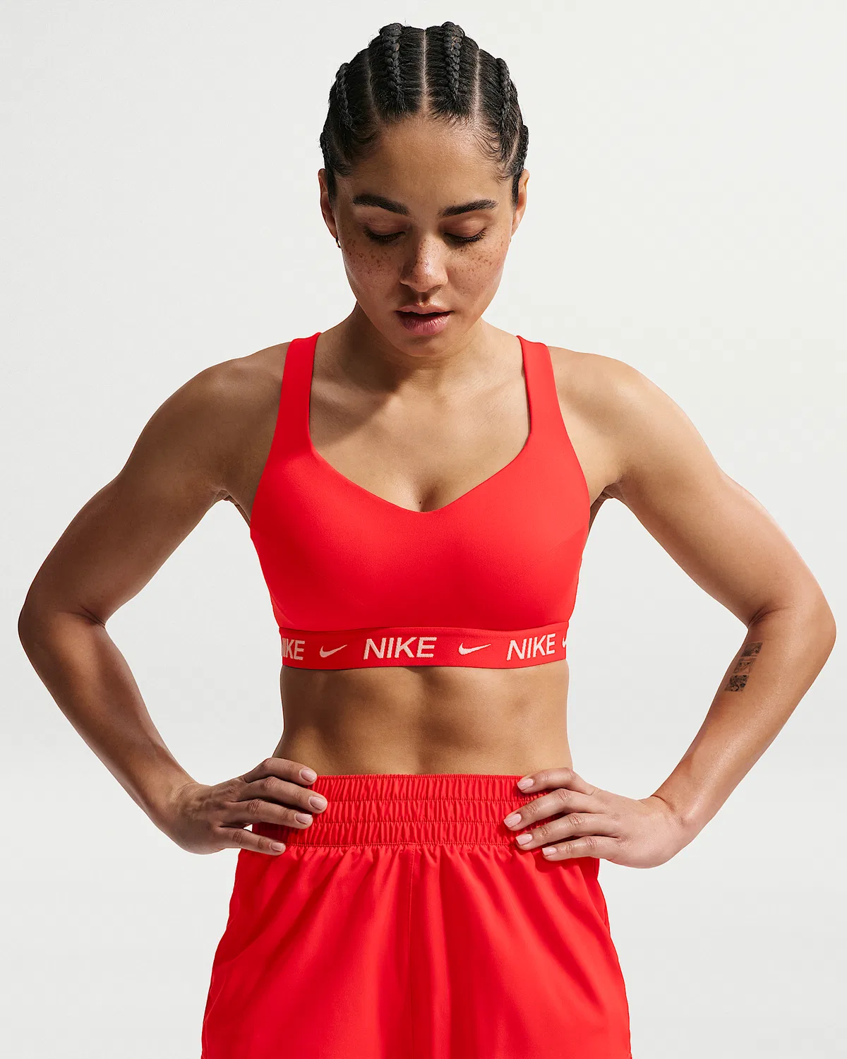 Женский спортивный бюстгальтер Nike Indy High Support с регулировкой и подкладкой, Light Crimson