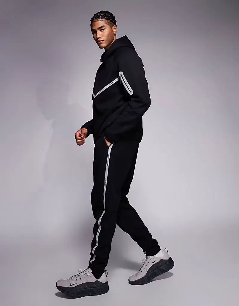 Светоотражающие спортивные штаны Nike Tech Fleece, черный — фото 3