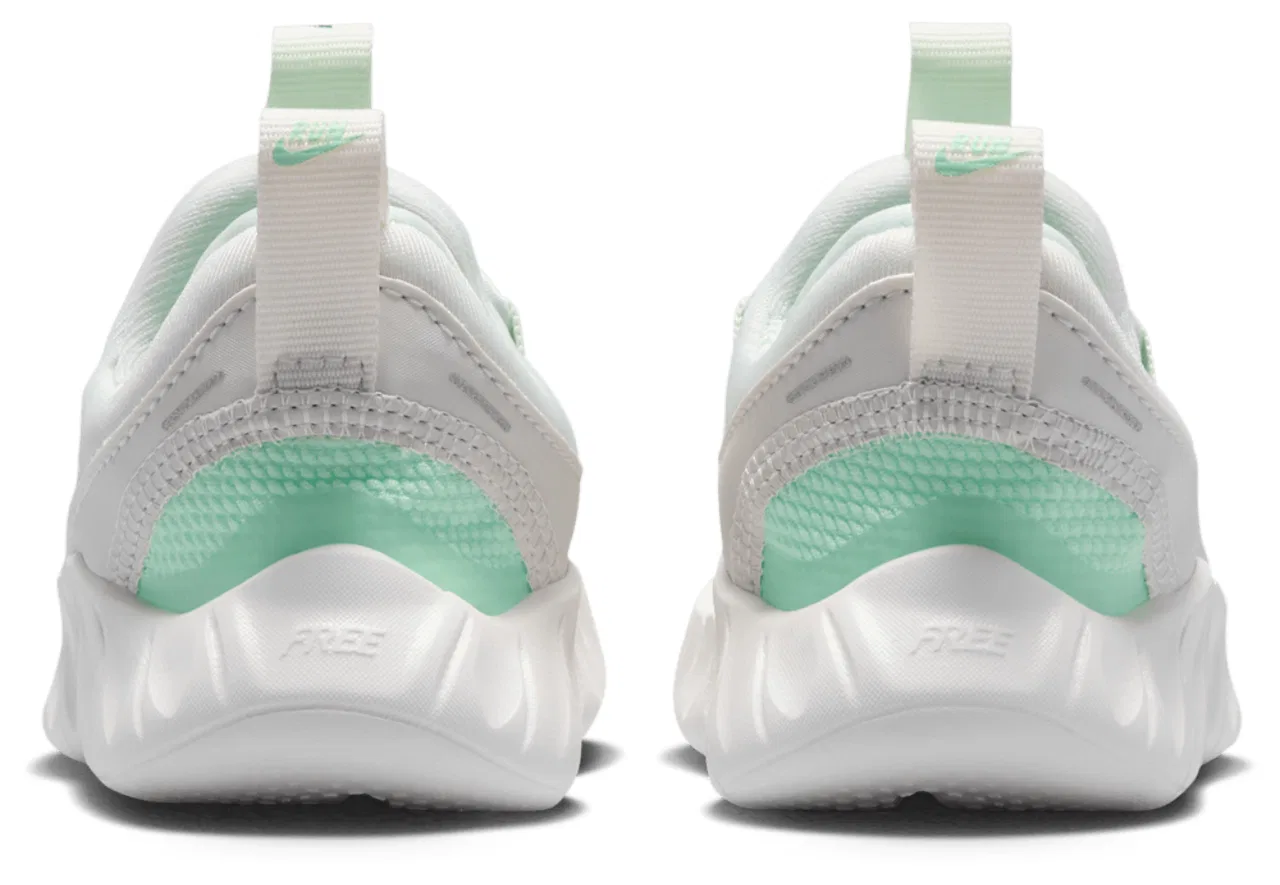 Беговые кроссовки для мальчиков Free Ride Nike, цвет Barely Green/Arctic Green/Bright Spruce — фото 3