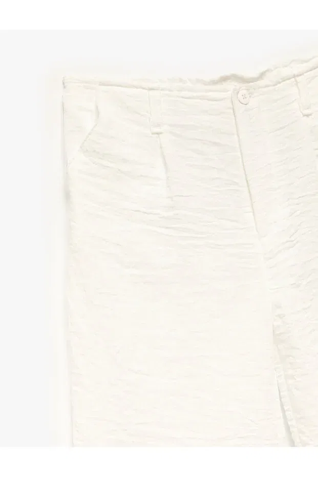 Детские брюки для девочек текстурированные с широкой штаниной Linen look textured wide leg trousers with pockets Koton, White — фото 3