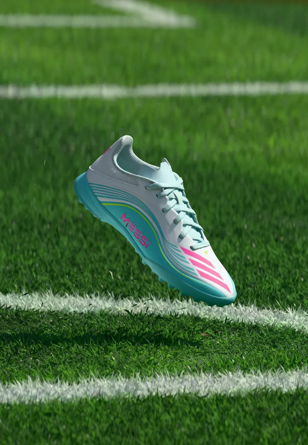 Детские футбольные бутсы F50 Messi League Turf унисекс - для искусственных газонов Adidas Performance, Footwear White/Lucid Pink/Flash Aqua