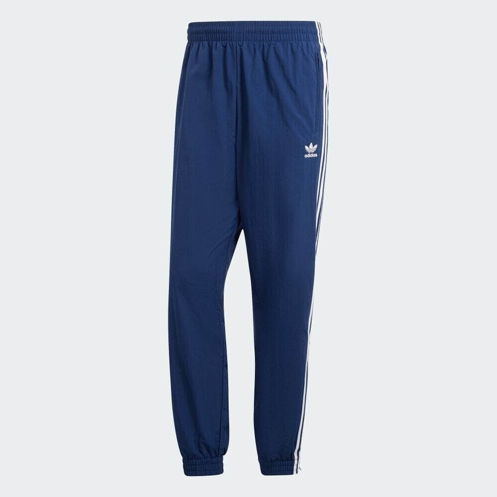 

Спортивные брюки Adidas Adicolor Woven Firebird Jersey, темно-синий
