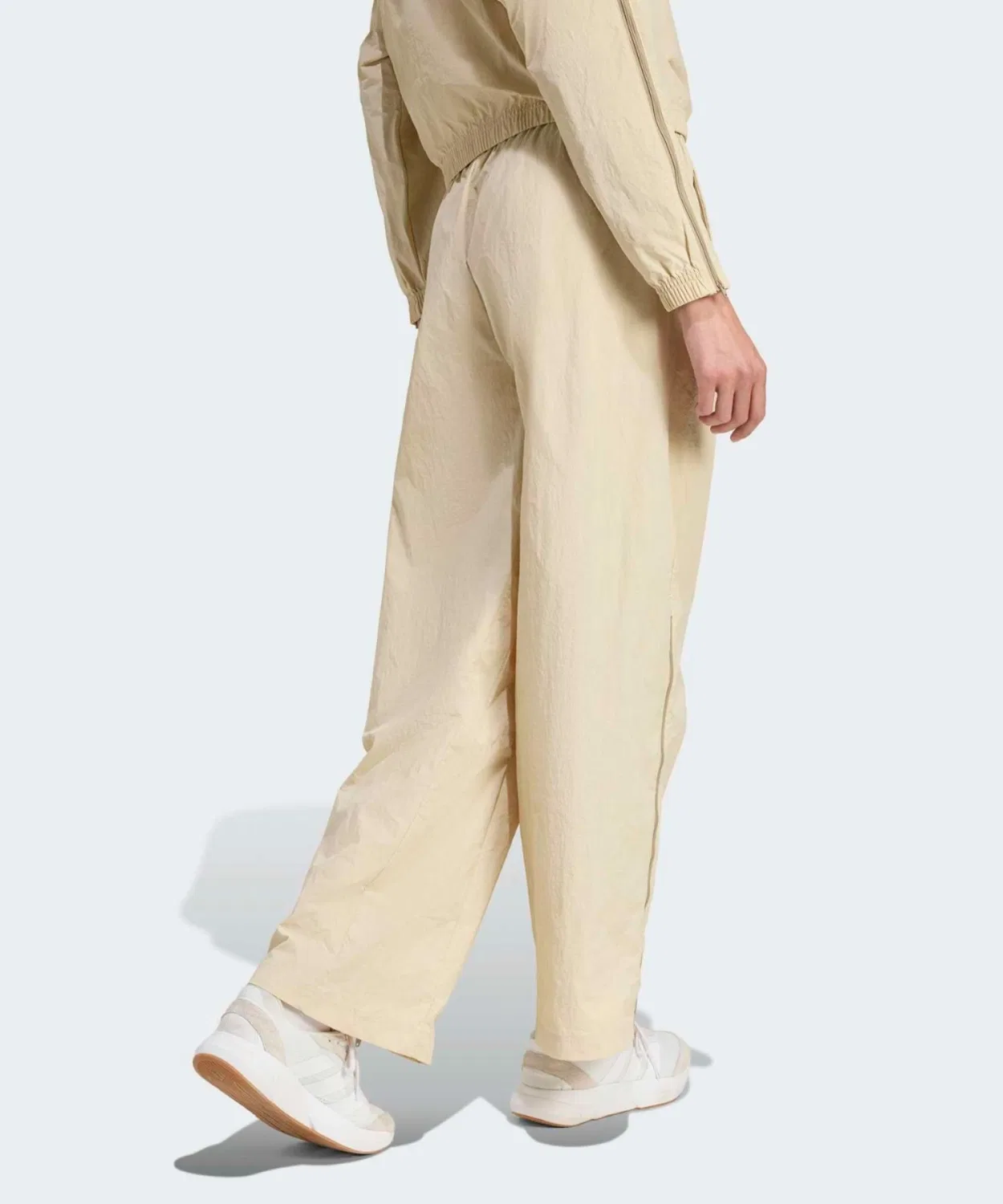 Женские спортивные брюки свободного кроя с застежкой-молнией City Tech Woven Zip Pants Adidas, Beige — фото 2