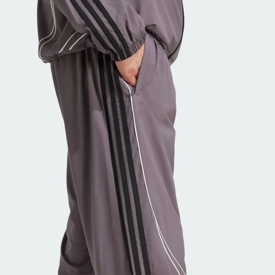 Спортивные брюки свободного кроя с принтом Teamgeist Adicolor adidas, Черно-белый — фото 4