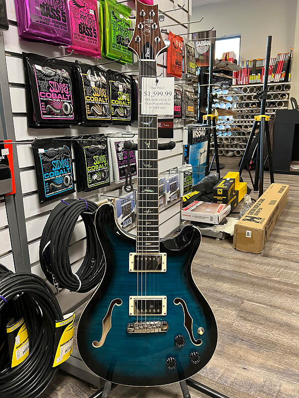 

PRS SE Hollowbody II Piezo открытая коробка 2022 Peacock Blue Burst