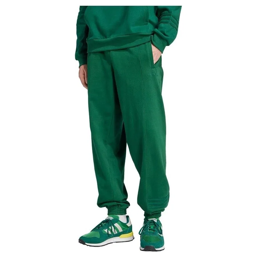 Спортивные брюки из футера с зауженными штанинами и 3 полосками adidas, Зеленый