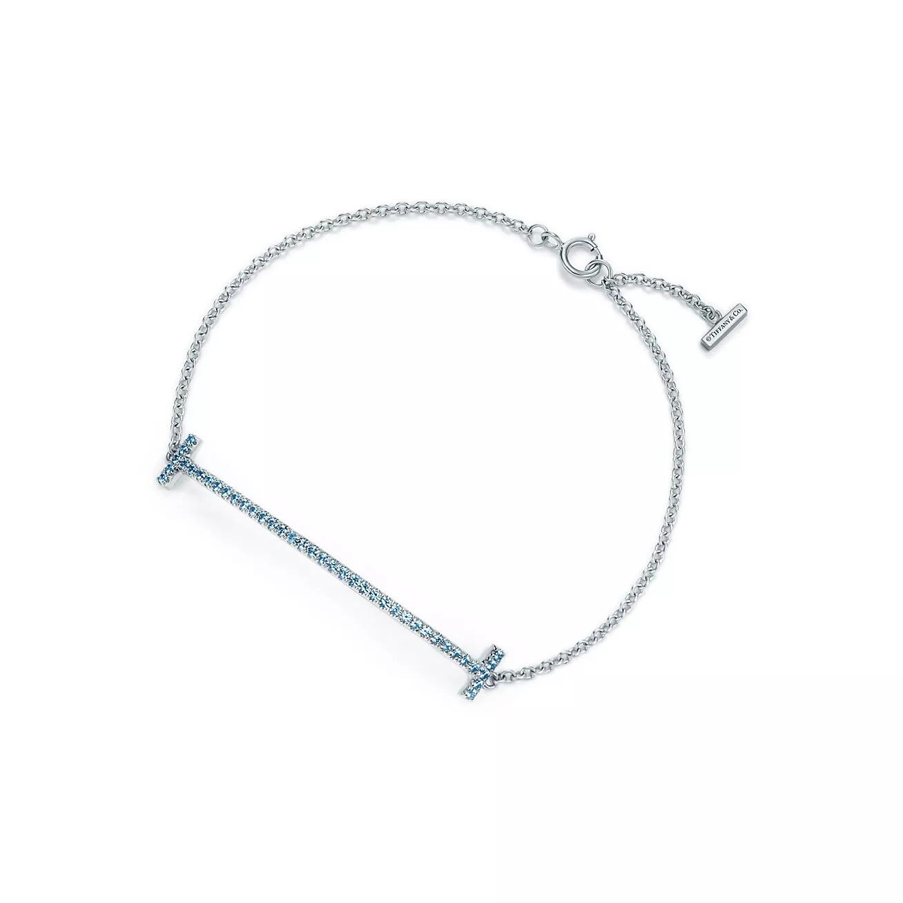 

Браслет Tiffany & Co. T Smile Chain, белое золото/топаз/голубой