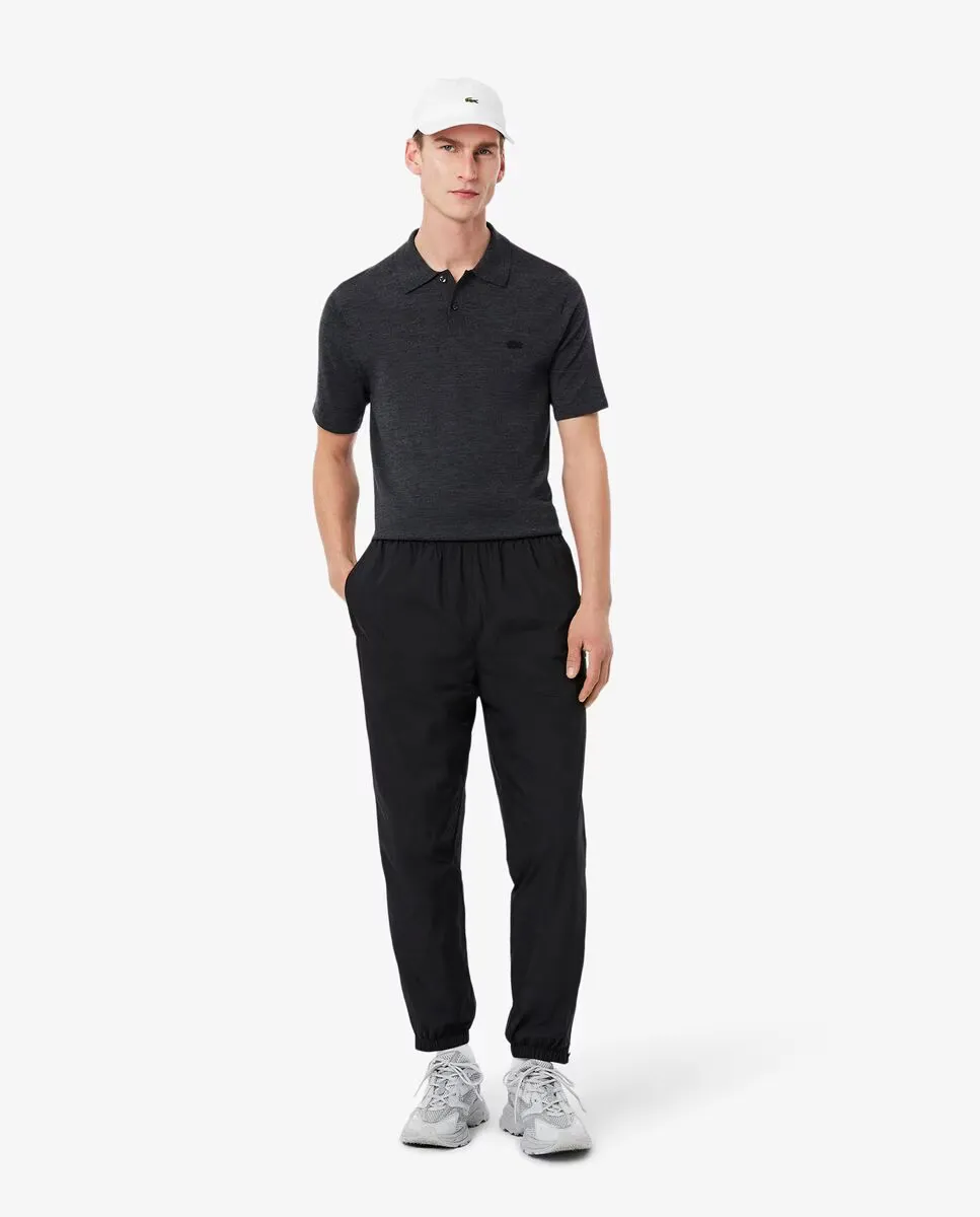 

Мужские водонепроницаемые легкие спортивные брюки Lacoste, черный