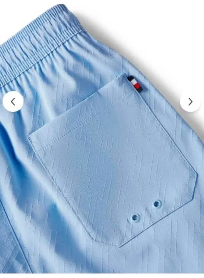 Tommy Hilfiger Шорты для плавания с жаккардовым принтом флагов, синий — фото 4