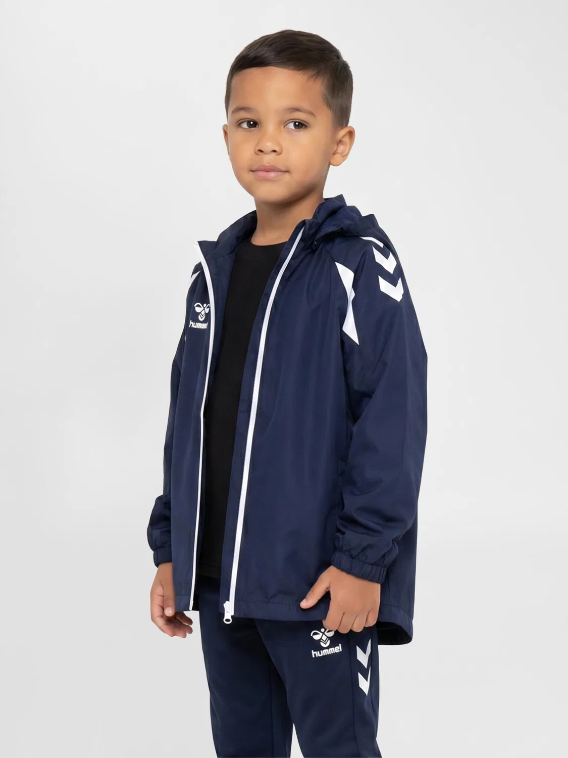 Детская функциональная куртка Hmlcore 2.0 All-Weather Jacket Kids Hummel, Mitternachtsindigo / Weiss