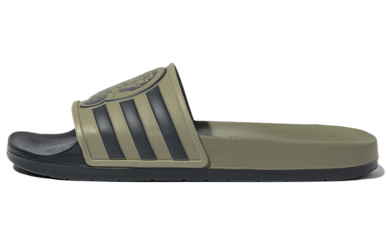 

Шлепанцы серии Adilette унисекс, карбоновый черный/зеленый Adidas