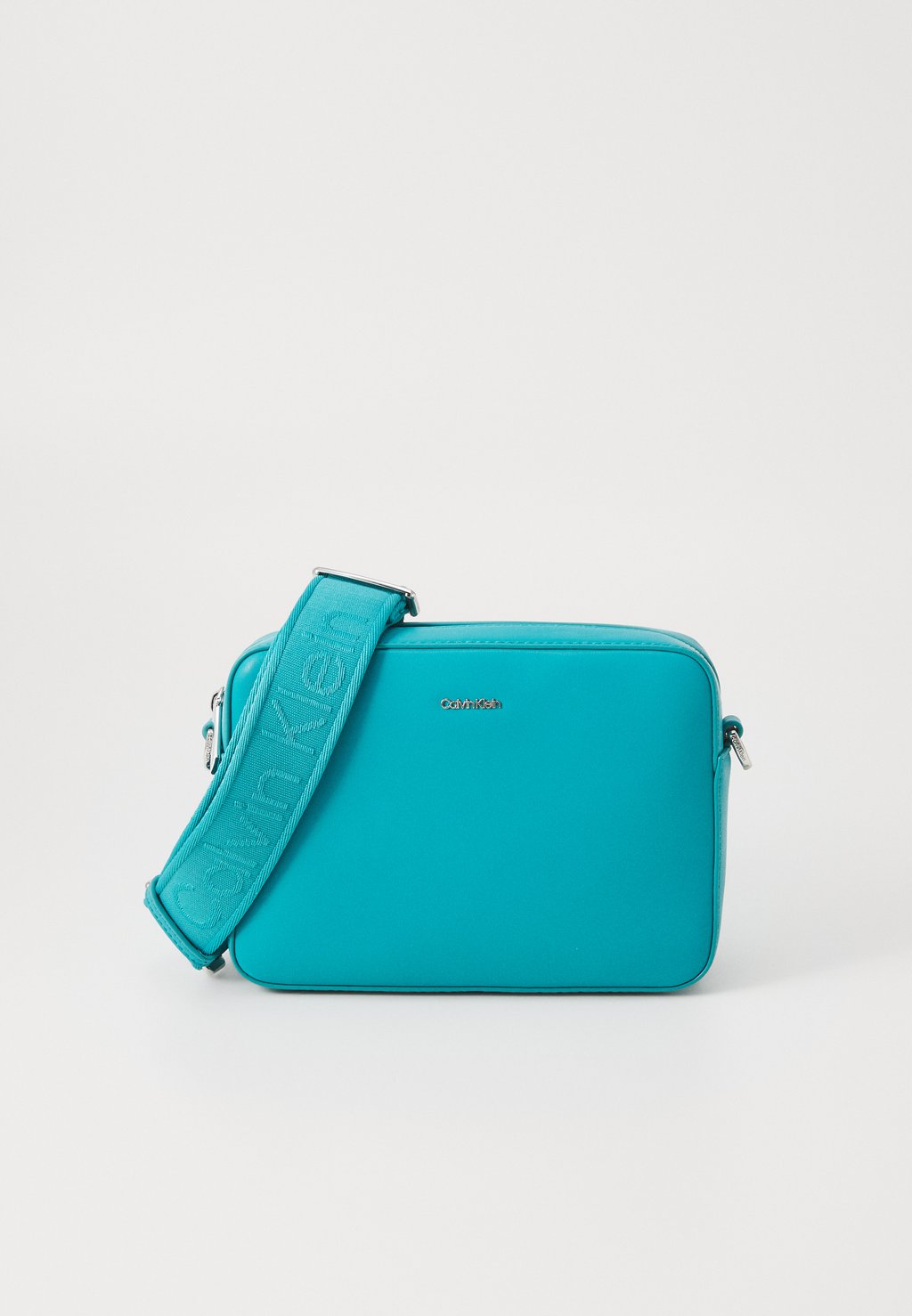 

Сумка через плечо MUST SMALL CAMERA BAG - Across body bag Calvin Klein, бирюзовый