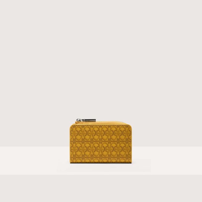 

Кошелек Coccinelle Metallic Coated Monogram, цвет Multi Soleado/Soleado