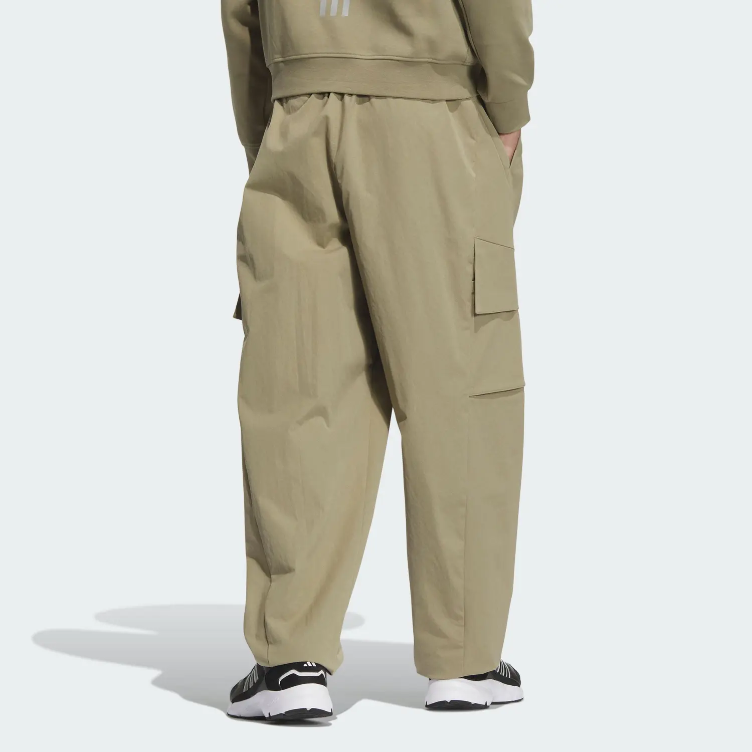 Футболка FW24 M TRAN PANT1 Повседневные брюки мужские оливковый зеленый Adidas — фото 4