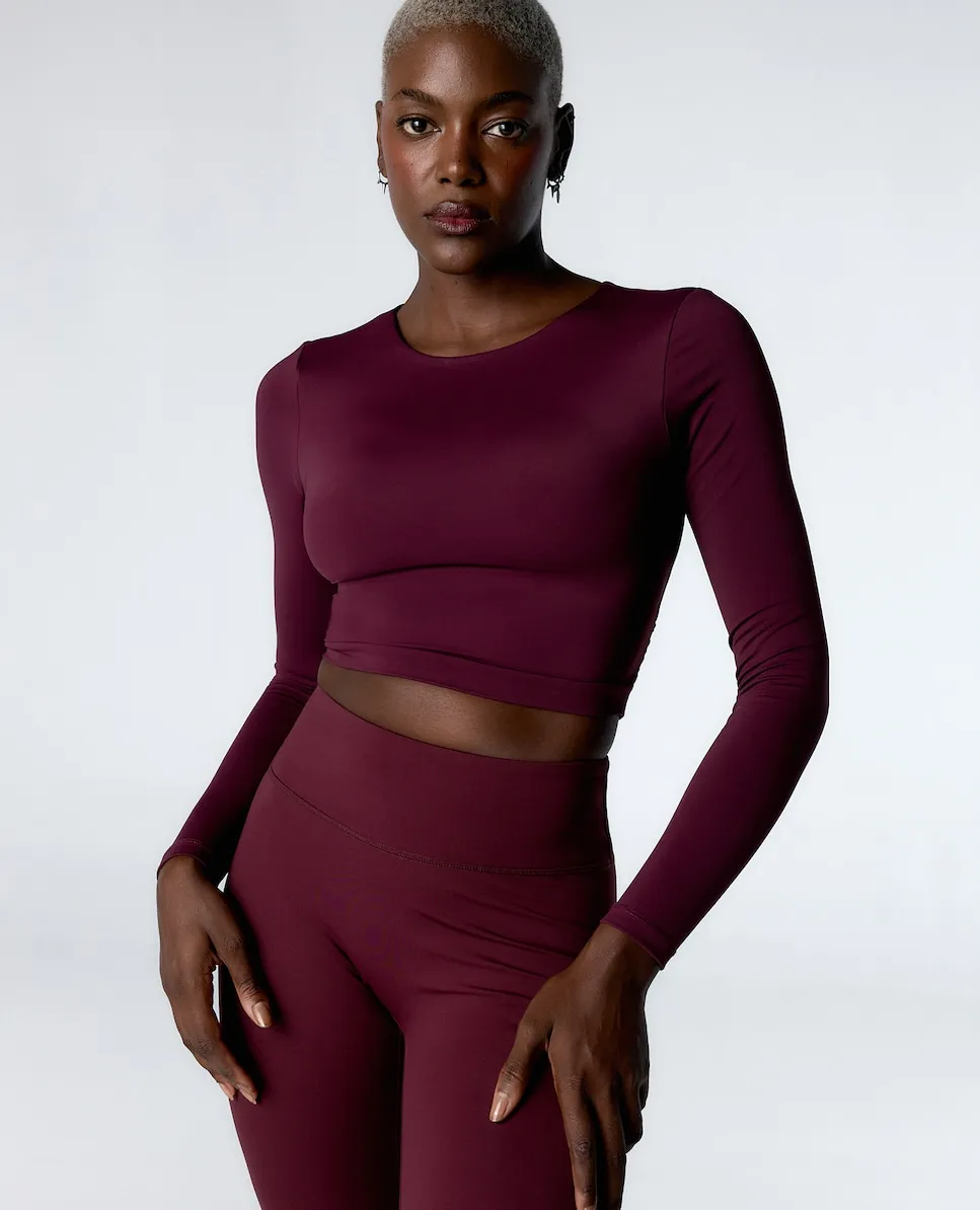 

Спортивный топ с длинными рукавами и средней поддержкой Black Limba, фиолетовый