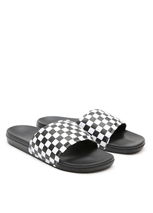 

Белые мужские тапочки Vans