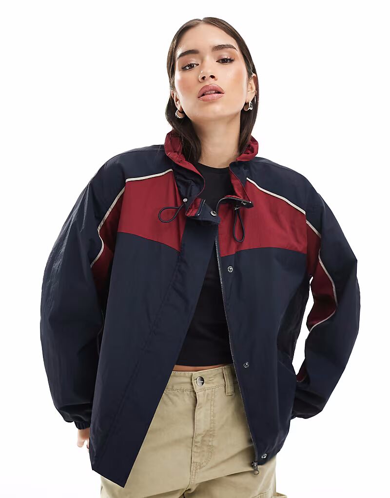 

Куртка-дождевик ASOS DESIGN со сборкой на шее в стиле колор-блок