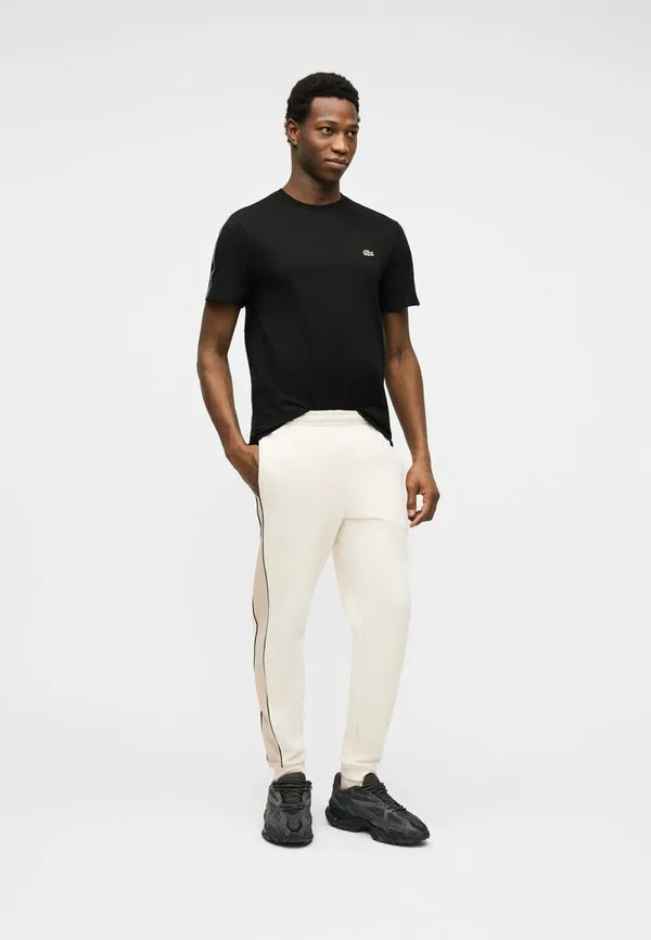 Спортивные штаны Lacoste Lapland/Lionne, хлопок, стандартная посадка, черный — фото 2