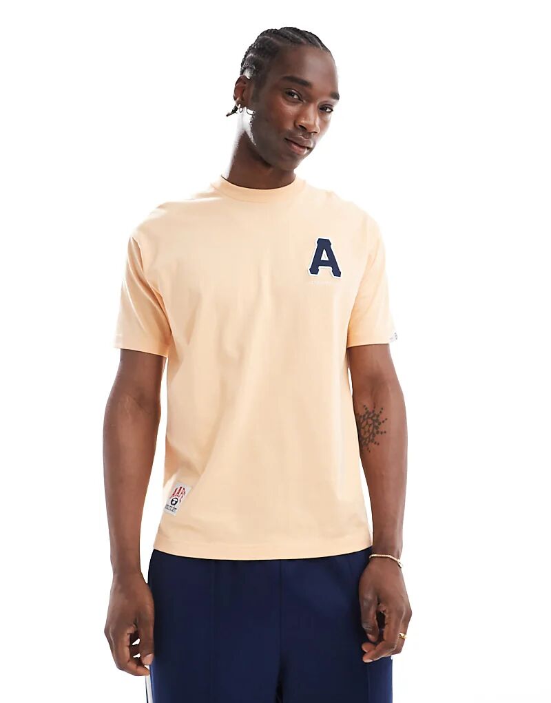 

Футболка с логотипом Aape by A Bathing Ape абрикосового цвета