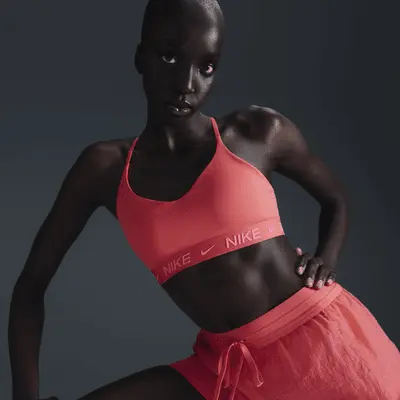 

Спортивный бюстгальтер Nike Indy Light Support, цвет Aster Pink