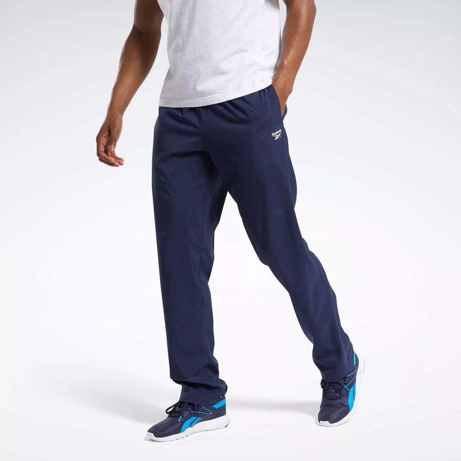 

Тканые брюки Training Essentials Reebok без подкладки, темно-синий