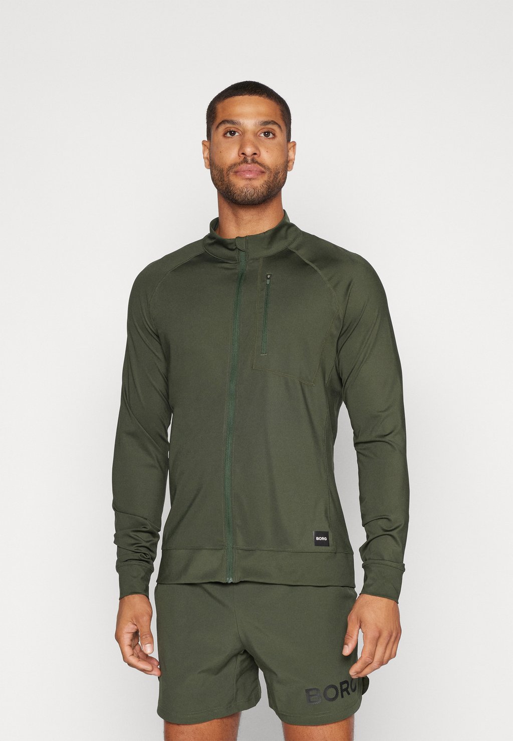 

Тренировочная куртка TRAINING MIDLAYER JACKET Björn Borg, оливковый