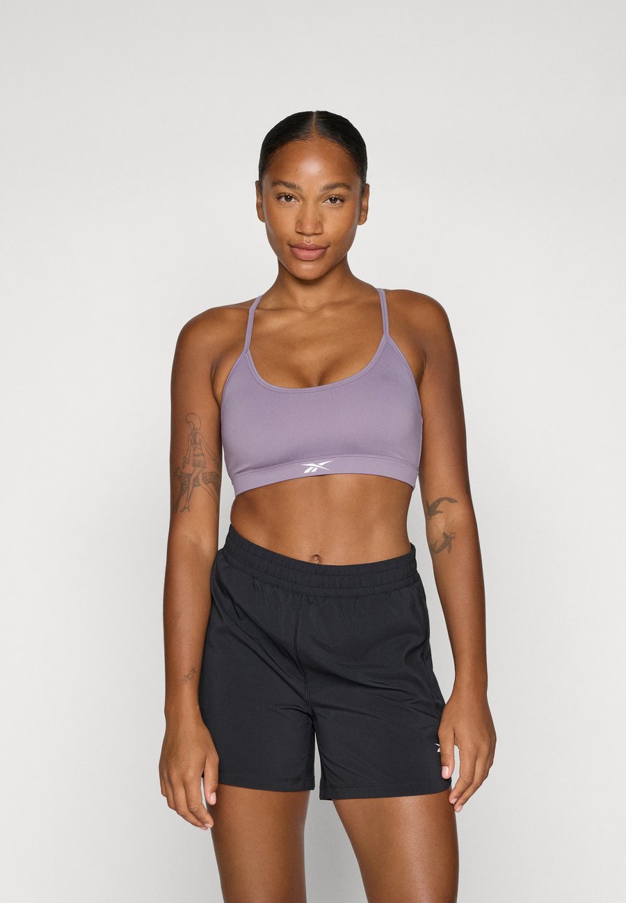 

Бюстгальтер Reebok KENDAL CORE STRAPPY BRA, Purple Fusion/Purple