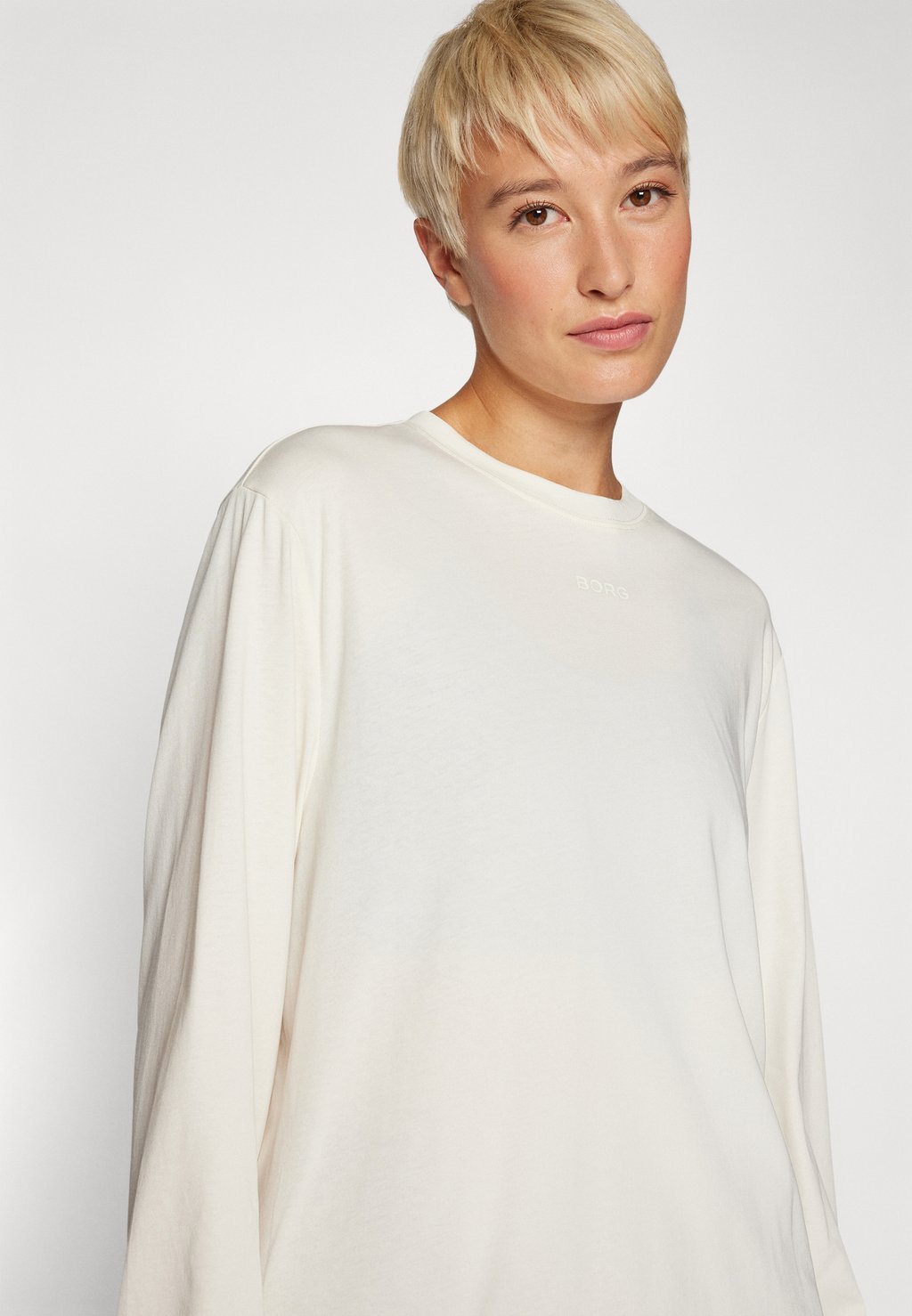 

Топ с длинными рукавами STUDIO LONGSLEEVE Björn Borg, молочный