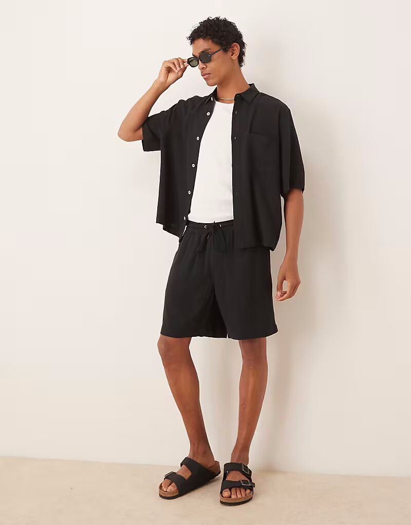 

Короткие шорты свободного кроя из льна ASOS DESIGN черного цвета